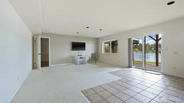 Lower level family room with slider to patio