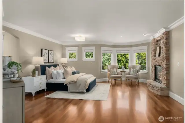A very large primary suite; room for a king bed, extra seating...