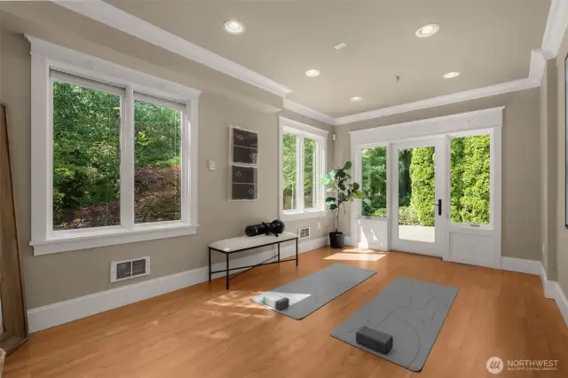 Beautiful trail view from the gym, 2nd office, game room or...convert to a 3rd garage bay.