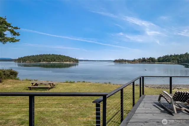 The views of the deck showcase marine life, even the occasional orcas and humpback whales, and island views. Straight ahead is Turn Island, with Lopez Island just beyond.