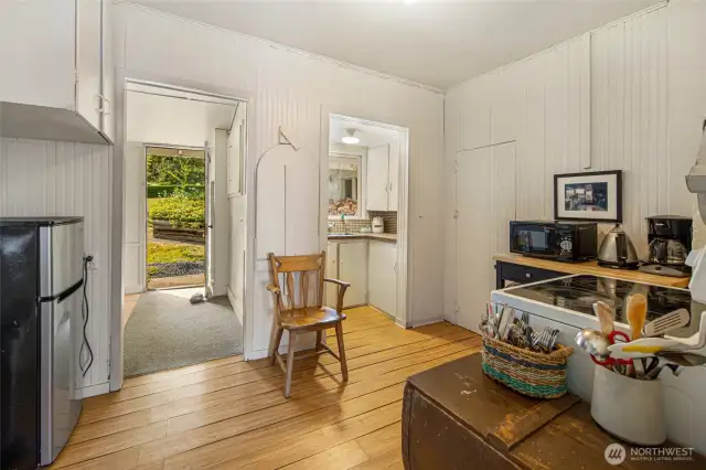 The entrance and rustic kitchen in the farmhouse.