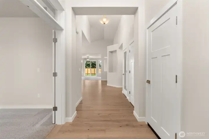 Welcome home! Step into the entry hall with hardwood flooring, contemporary details and white millwork throughout.