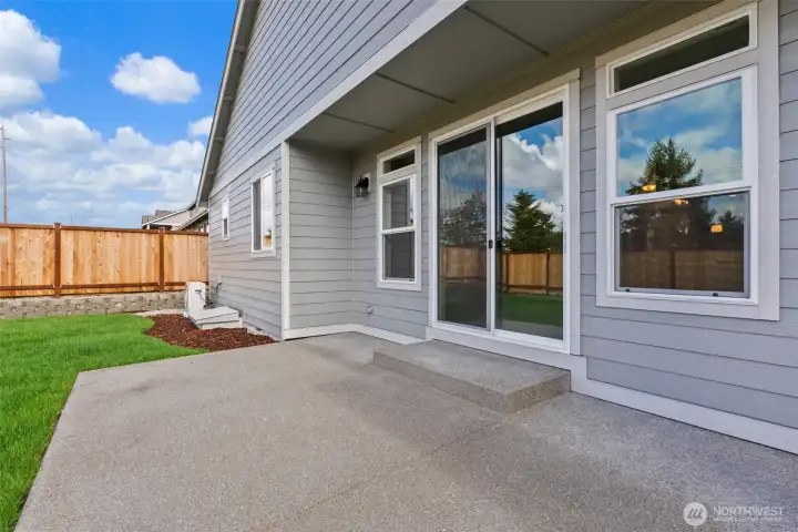 Extended patio for additional outdoor space.