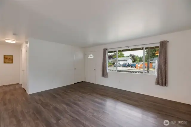 Large living room with mini split for heat and cool.