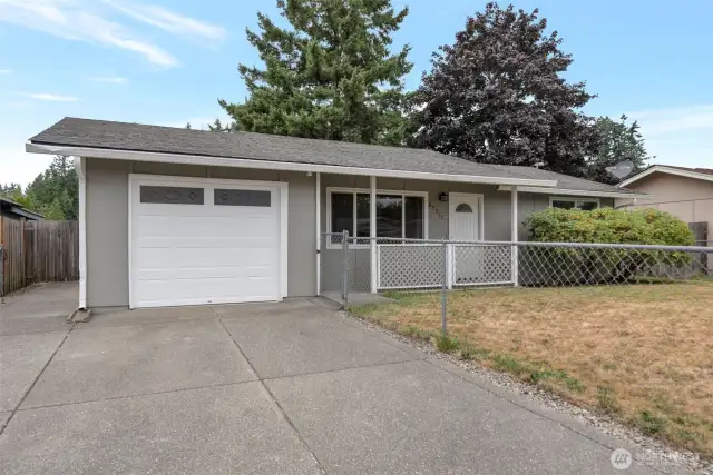 Large driveway with garage.