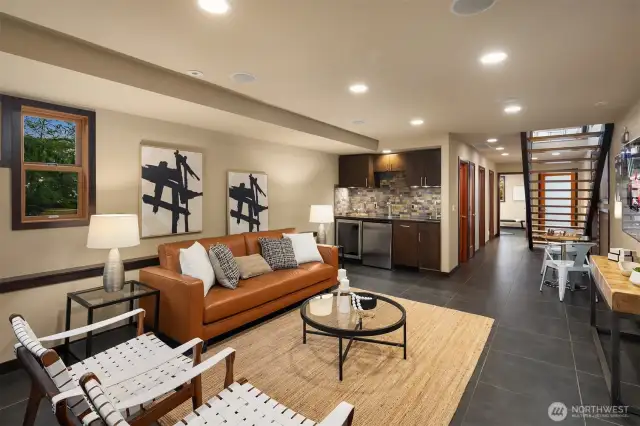 Family Room with mini bar with Kegerator, Wine Refrigerator, Dishwasher and Heated Tile Flooring.