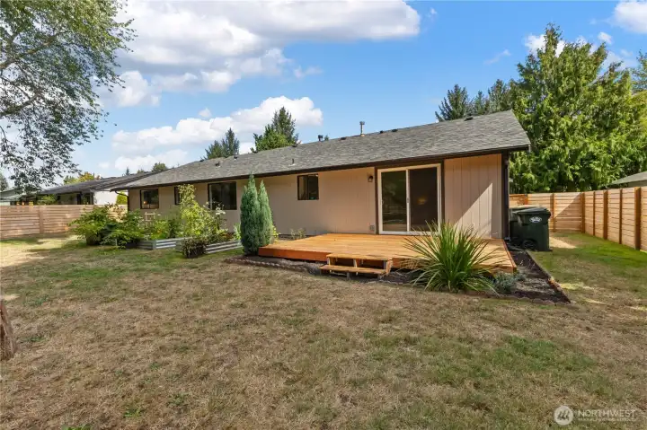 Large backyard with deck off the slider