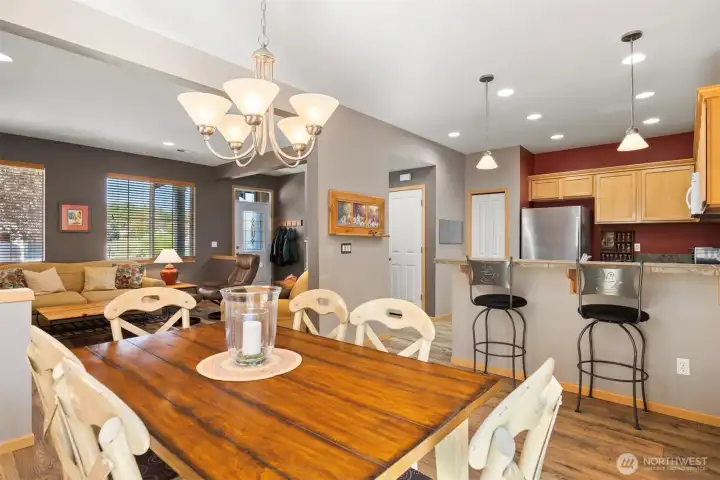 Looking across the dining room toward the living room and front entry.