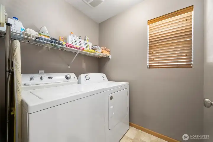 The laundry room is conveniently located upstairs with all the bedrooms.