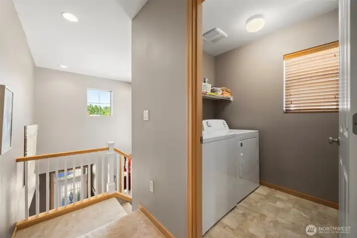 Looking from the laundry room toward the stiarway.