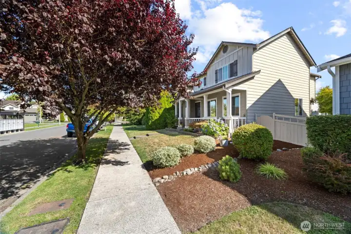 Looking at the home from down the street.