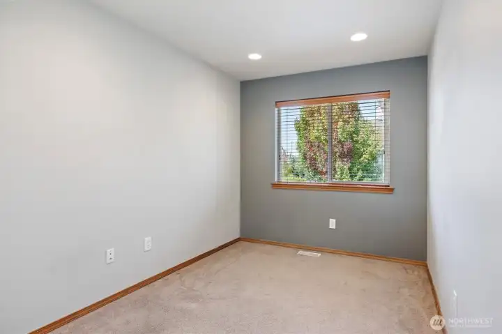 Loft bonus room upstairs opens to the hallway and the two story entry at the base of the stairs.
