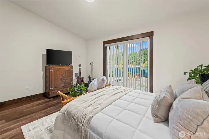 Every room in the house has a door to the outside.  Each bedroom has private access to the deck.