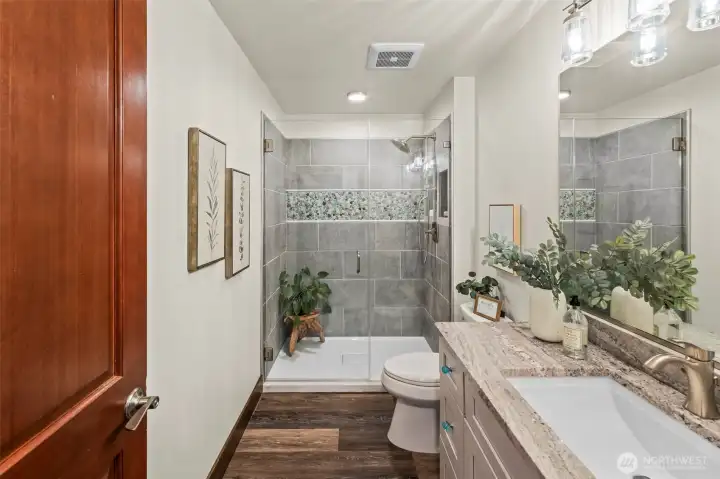 The guest bath is equally well appointed