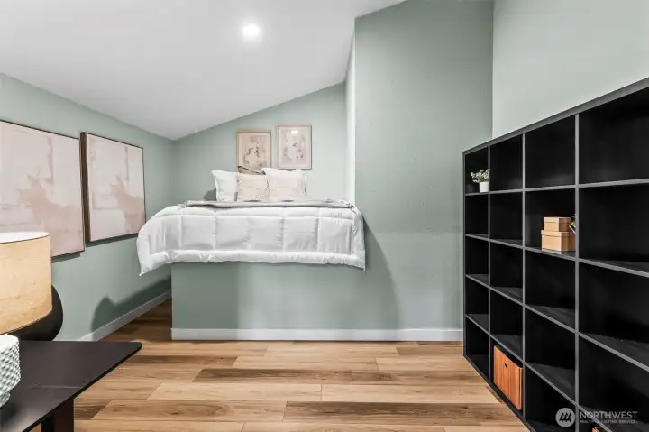 An extra loft area provides a playful setting for moments and memories.