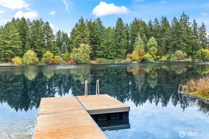 A brand new dock installed 2025 takes out an immense potential expense. The materials complement the surroundings looking both rich and natural.