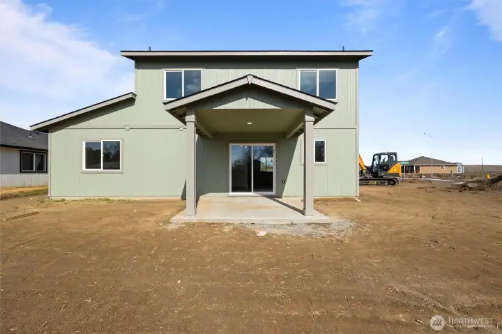 photo was taken before the grass and sprinklers were installed