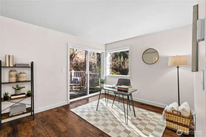 The great room, with access via the sliding glass door to your personal, fenced-in patio.