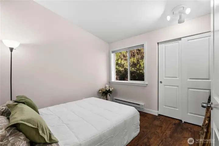 Bedroom 2 - similarly sized to bedroom 1, but a bit more shaded by trees. Perfect for a guest bedroom or office.