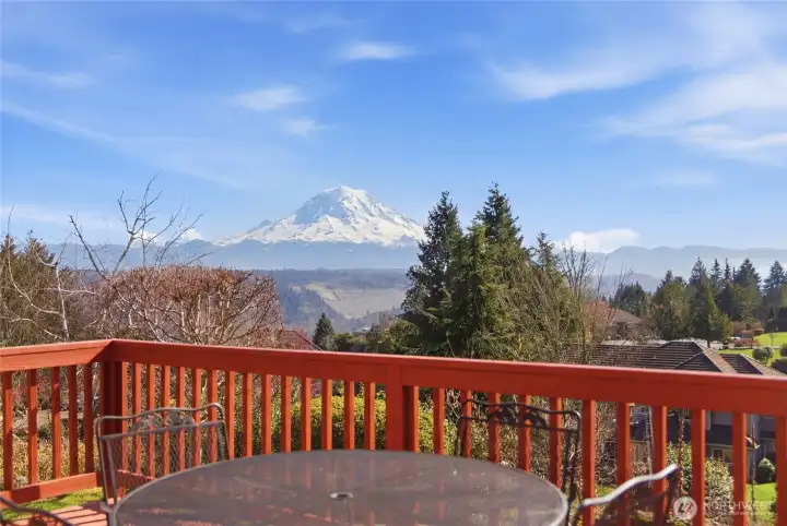 Take in exquisite views of Mt. Rainier and the foothills from your beautiful home and extensive outdoor living space. Over 1,500 sf of decking.