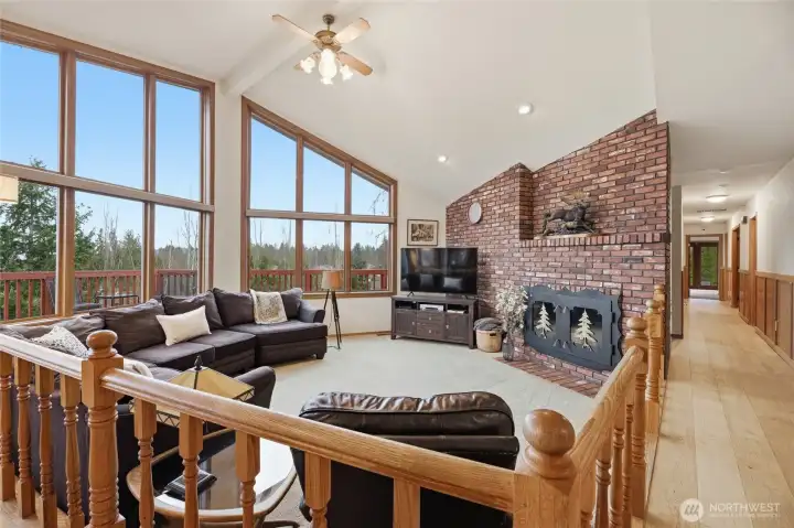 The living room/great room area has new windows which let the outdoors in. This home was thoughtfully designed to take in the magnificent views.