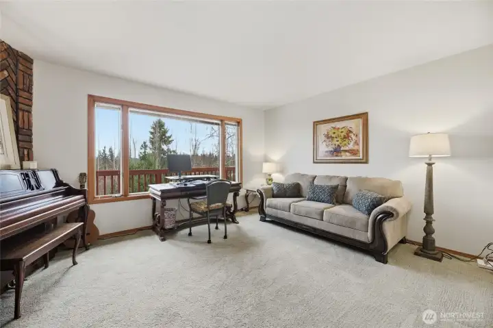 Another living space which is used as an office and music room.