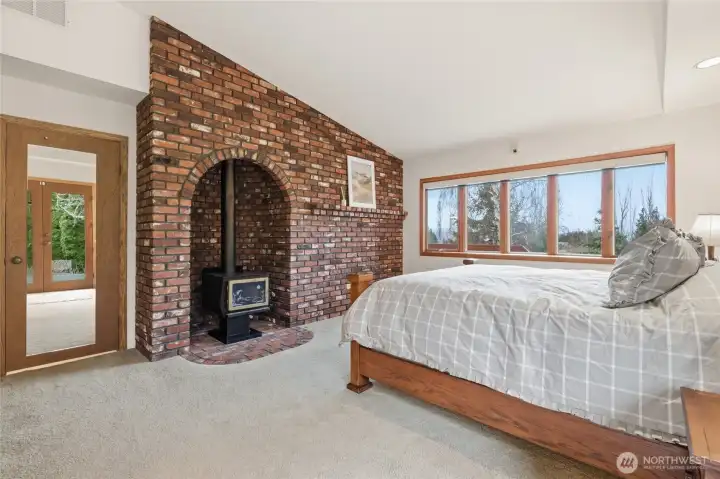 A cozy fireplace area in the Primary Suite.