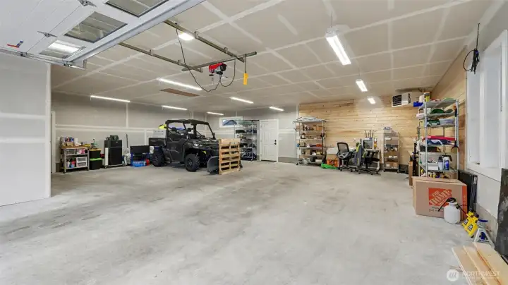 An Impressive Detached Garage & Shop with all the Amenities you could need.  1/2 Bath, Heat, Wifi Ready, Hot & Cold Running Water and More. Don't forget to check out the RV area which has Built-In Shelves for Storage.