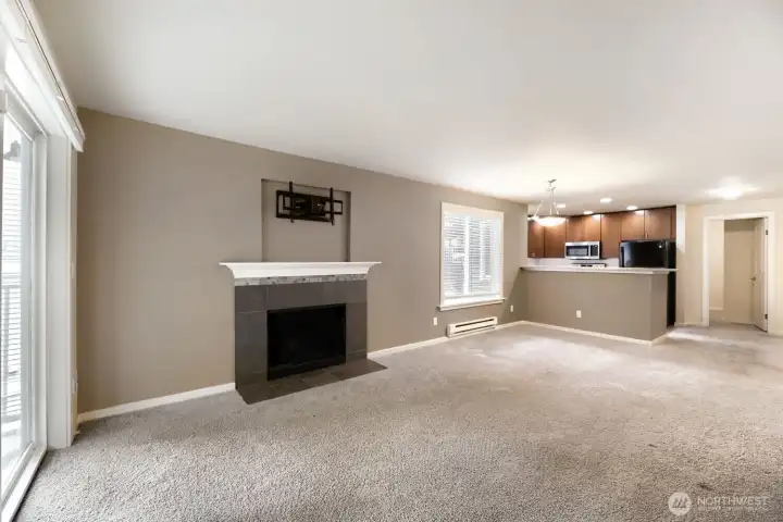 Living room with wood burning fireplace