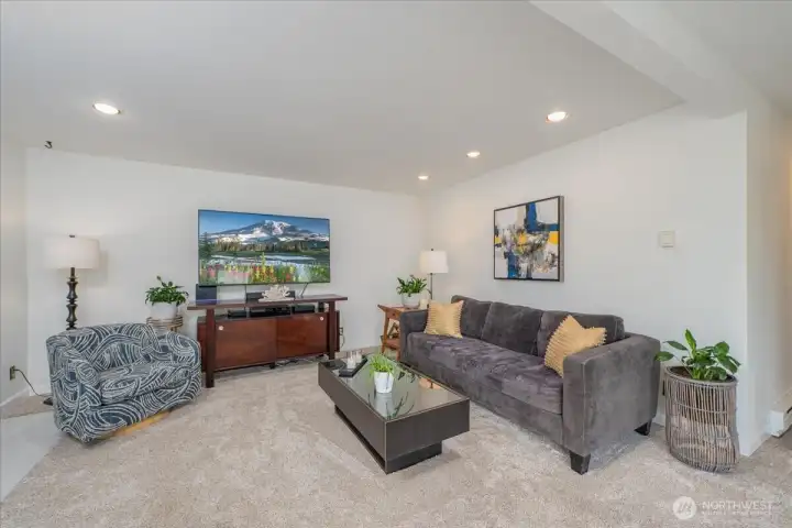 Llarge living room open to dining room and kitchen.