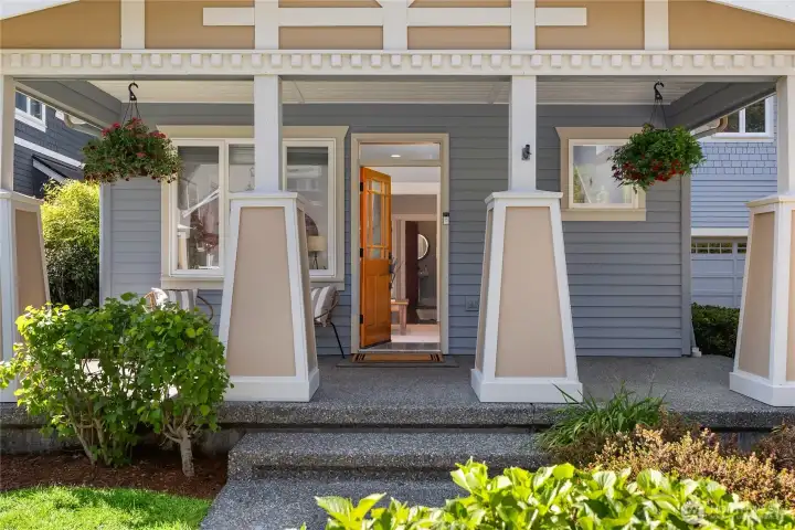 An inviting covered front porch welcomes you into the home.