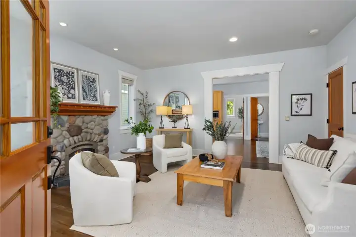 The main level of the home features beautiful Brazilian walnut flooring, generous ceiling heights and a cozy river rock fireplace. Throughout the home, enjoy the quality solid wood doors.