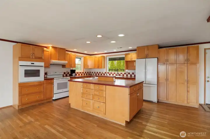 huge kitchen with open dining area and terrific views of the pasture and mountains beyond!