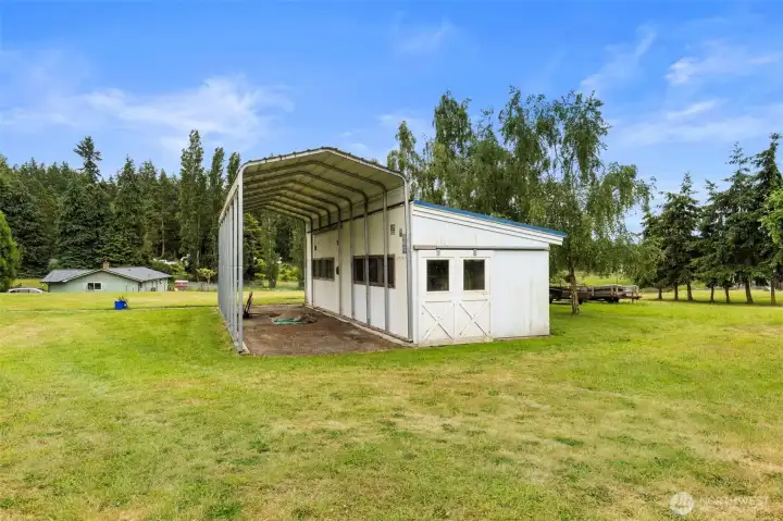 12x40 covered RV storage with attached 12x40 permitted garden shed! Thats a lot of room for projects!