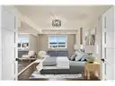 Charming downstairs bedroom featuring mirrored wall accents and a fun hidden room tucked inside the closet — a dream space for kids or creative play. Charming downstairs bedroom featuring mirrored wall accents and a fun hidden room tucked inside the closet — a dream space for kids or creative play.