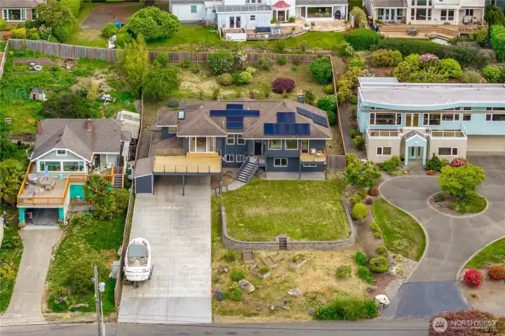 There is so much parking here, 2 car garage, covered carport and still room for a boat, RV, or more vehicles! There is so much parking here, 2 car garage, covered carport and still room for a boat, RV, or more vehicles!