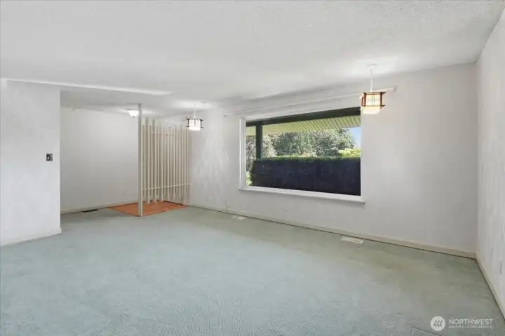 Living Room looking back towards foyer. Note large picture window.