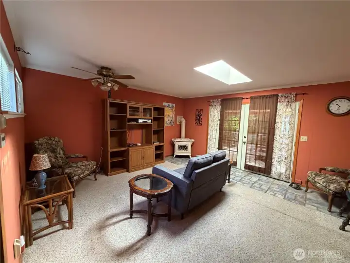 Open & cozy family room with french doors for easy entrance to the home. The home even comes furnished ! Open & cozy family room with french doors for easy entrance to the home. The home even comes furnished !