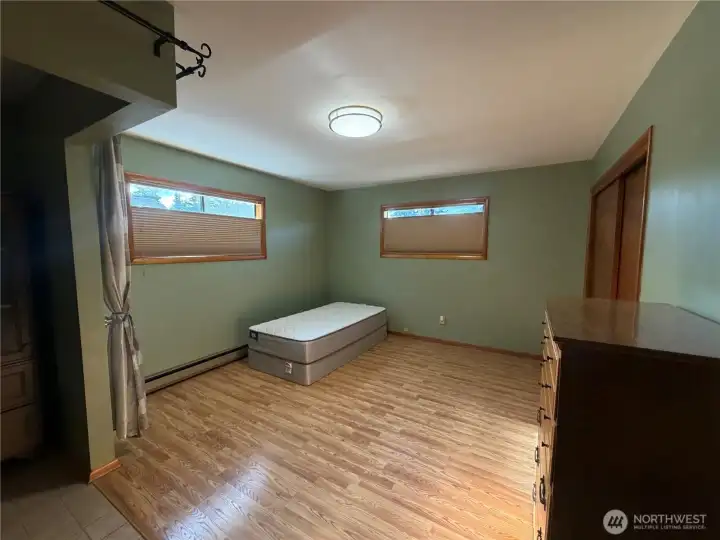 Main bedroom with handicapped bath at left. Closets at right. Main bedroom with handicapped bath at left. Closets at right.