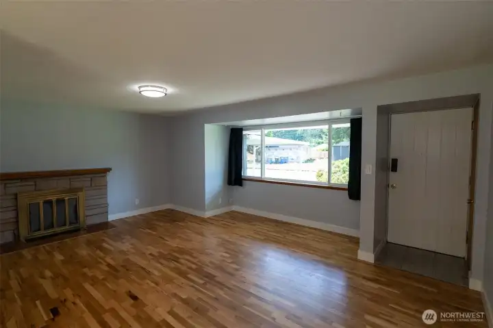 Full living room view, love all the space! You can arrange your furniture pretty much any way you like.