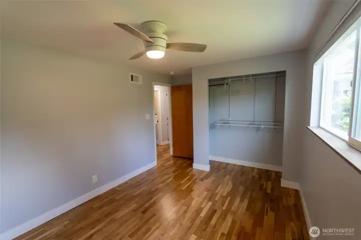 Bedroom #1, convenient ceiling fan for comfort year round.