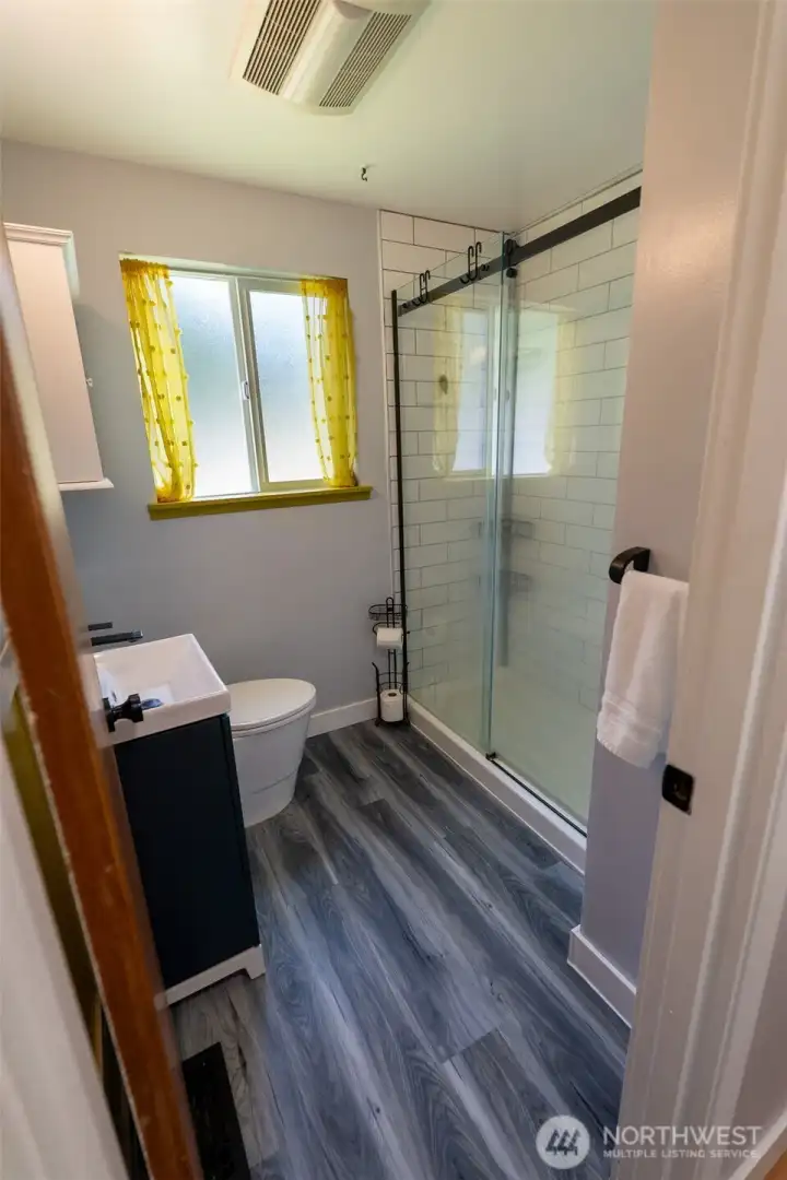 Bathroom view two, love the updates to this 3/4 bath.