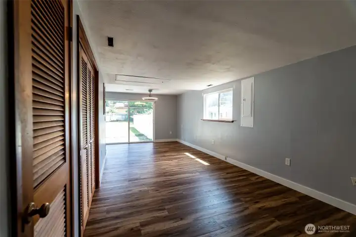 View from your carport/back hall entry to your rec room.
