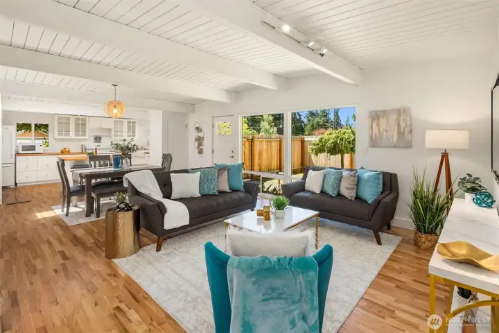 Looking from Hallway Through Great Room to Entry Door,  Dining Area and Kitchen, Fully Fenced Yard through West Facing Windows