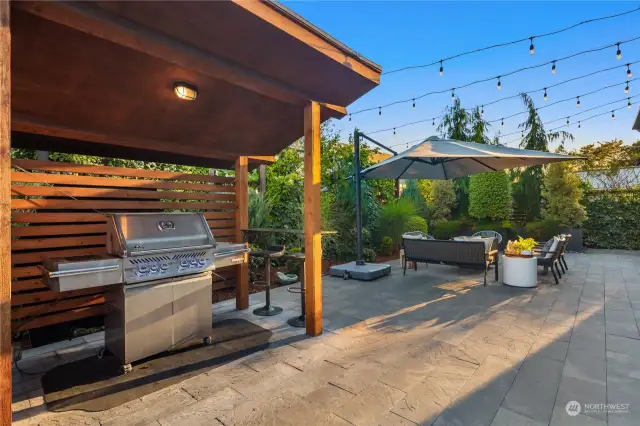 No detail left untouched. The extra tall, steel handmade fencing and established landscaping create ultimate privacy and City Oasis. Both sides of the fully fenced backyard have custom steel gates. Not only is it supremely private but secure.