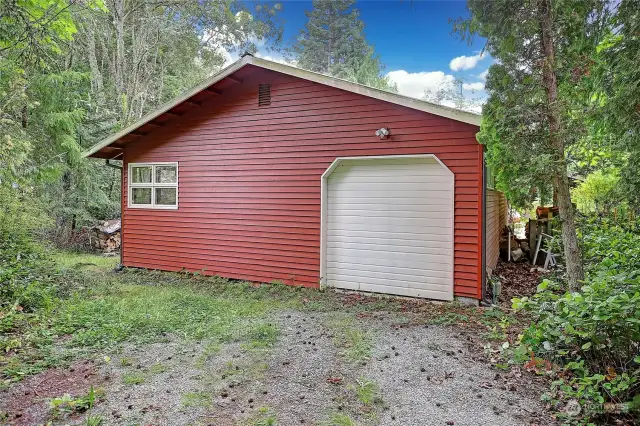 Back of garage and ADU with seperate driveway and parking.