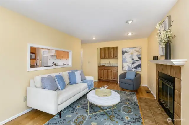 Family room features wood-burning fireplace.