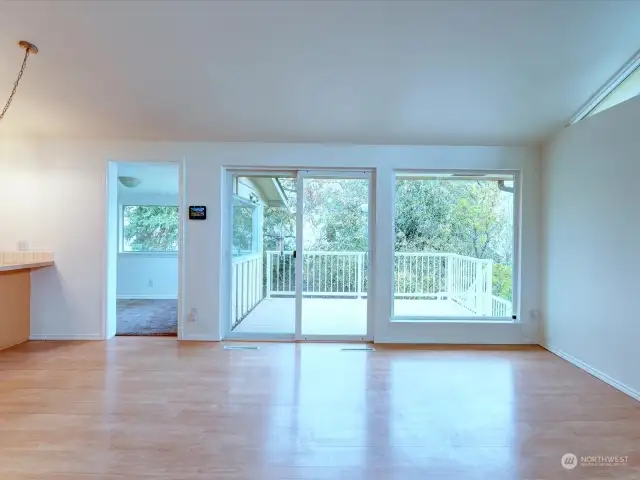 View from living room. Sun room access on left.