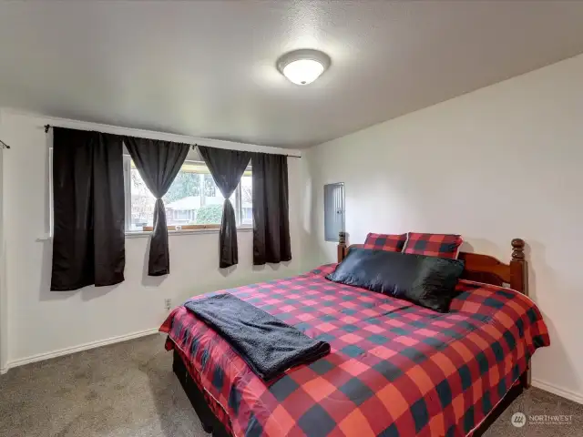 Upper level bedroom facing street.