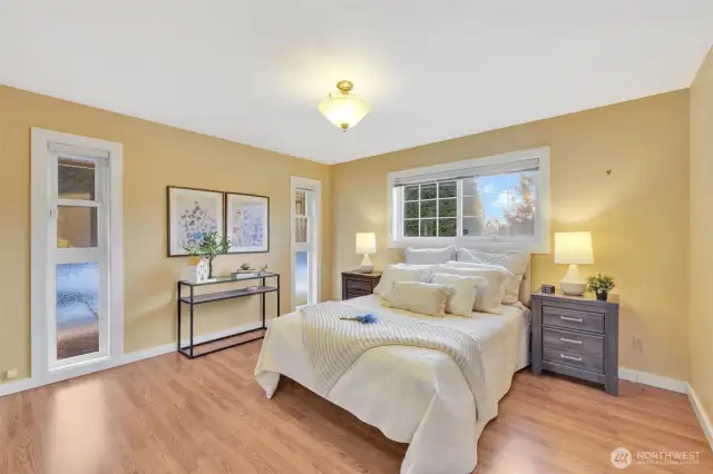 Primary bedroom - Queen size bed used in staging the home.